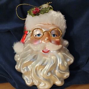 Festive Santa Claus Ornament with Gold Accents